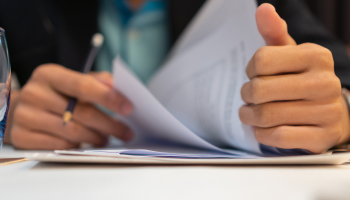 A person holds a document